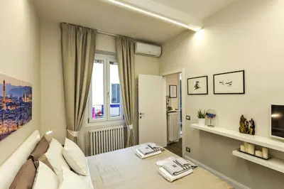 Letto o letti in una camera di Little Suite Fortezza