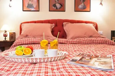 Letto o letti in una camera di Via dei Fossi apartment