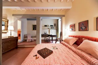 Letto o letti in una camera di Via dei Fossi apartment