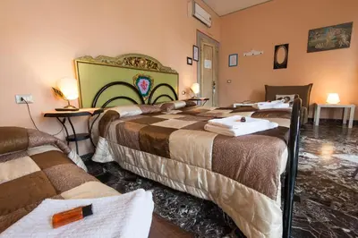 Letto o letti in una camera di Soggiorno Fortezza Fiorentina