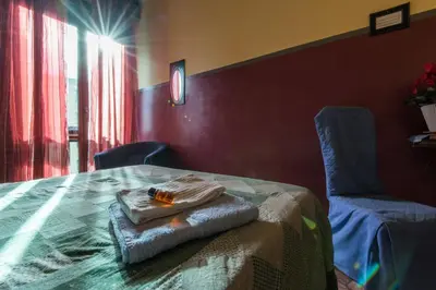 Letto o letti in una camera di Soggiorno Fortezza Fiorentina