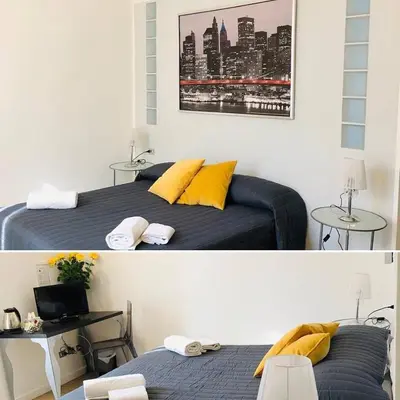 Letto o letti in una camera di B&B Leopoldo