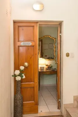 Letto o letti in una camera di Affittacamere Benedetta