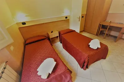 Letto o letti in una camera di Hotel Palazzuolo
