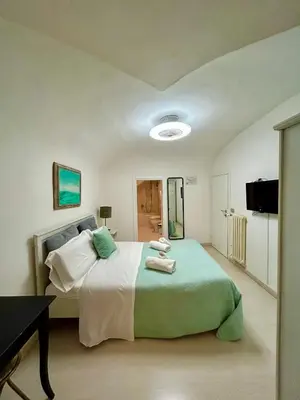 Letto o letti in una camera di Gattopardo Rooms Florence