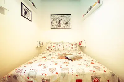 Letto o letti in una camera di Mimì Suite