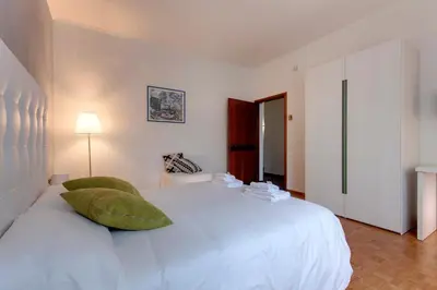 Letto o letti in una camera di Lungarno Apartment by Mamo Florence
