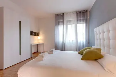 Letto o letti in una camera di Lungarno Apartment by Mamo Florence