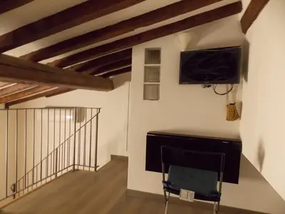 TV o dispositivi per l'intrattenimento presso Il gatto con gli stivali suite - locazione turistica
