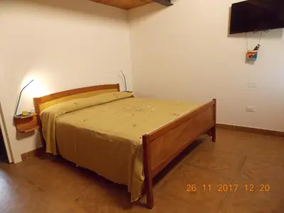 Letto o letti in una camera di Il gatto con gli stivali suite - locazione turistica