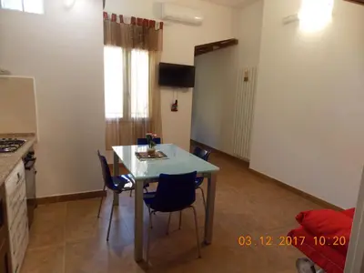 Cucina o angolo cottura di Il gatto con gli stivali suite - locazione turistica
