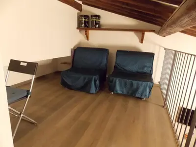 Area soggiorno di Il gatto con gli stivali suite - locazione turistica