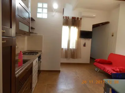 Cucina o angolo cottura di Il gatto con gli stivali suite - locazione turistica