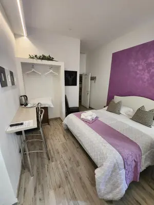 Letto o letti in una camera di Soggiorno La Coccinella