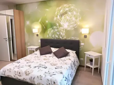 Letto o letti in una camera di Settimo Cielo