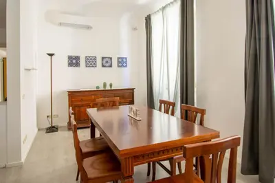 Area soggiorno di Vasco Pratolini Apartment di Stefania Sesto