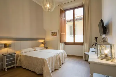 Letto o letti in una camera di Iris Apartments by Mmega