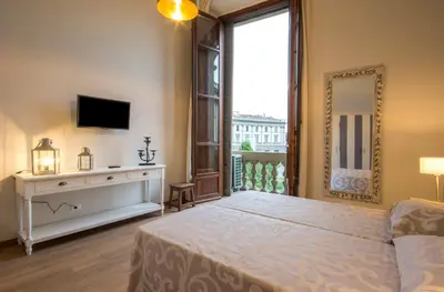 Letto o letti in una camera di Iris Apartments by Mmega