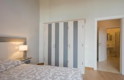 Letto o letti in una camera di Iris Apartments by Mmega