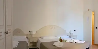 Letto o letti in una camera di La Spiga Affittacamere