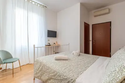 Letto o letti in una camera di Il Terrazzino Su Boboli
