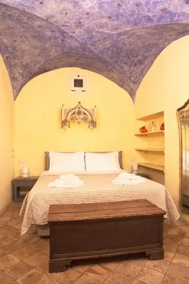 Letto o letti in una camera di Berardi Palace Apartments