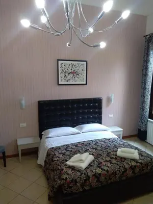 Letto o letti in una camera di Adelaide House