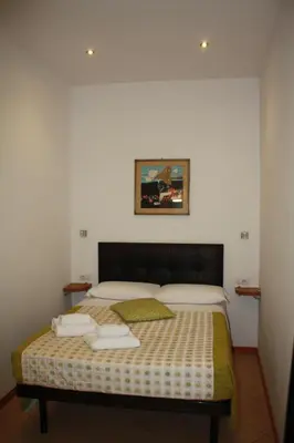 Letto o letti in una camera di Adelaide House