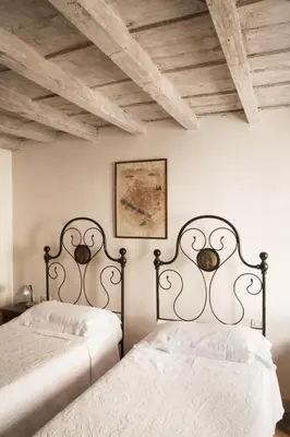 Letto o letti in una camera di Wp Relais Renaissance Retreat