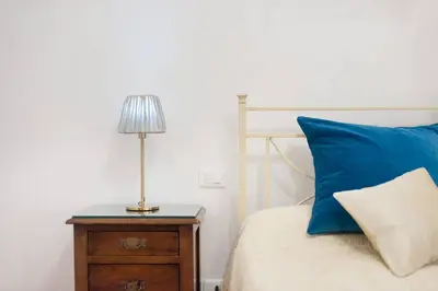 Letto o letti in una camera di Love weekend near Piazza Ognissanti