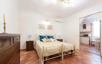Letto o letti in una camera di Love weekend near Piazza Ognissanti