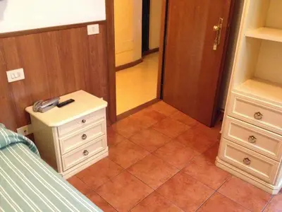 Letto o letti in una camera di Albergo Sonia