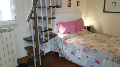 Letto o letti in una camera di Sunflower Firenze Centro