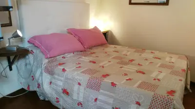 Letto o letti in una camera di Sunflower Firenze Centro