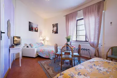Letto o letti in una camera di 1900 Artevita B&B