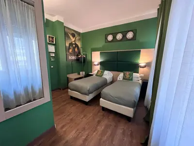 Letto o letti in una camera di BOBOTEL Rooms in City Center