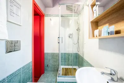 Bagno di BOBOTEL Rooms in City Center