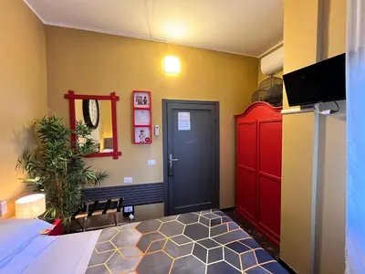 Letto o letti in una camera di BOBOTEL Rooms in City Center