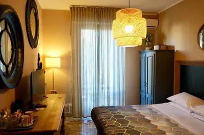 Letto o letti in una camera di BOBOTEL Rooms in City Center