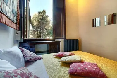 Letto o letti in una camera di Two Bedrooms Apartment Near The Duomo Firenze