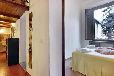 Letto o letti in una camera di Two Bedrooms Apartment Near The Duomo Firenze