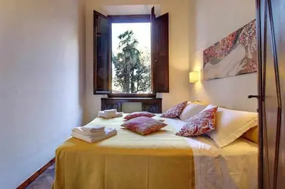 Letto o letti in una camera di Two Bedrooms Apartment Near The Duomo Firenze