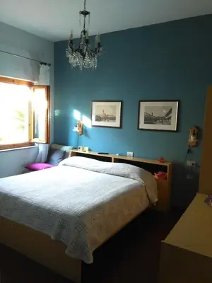 Letto o letti in una camera di Albergo Villa Sorriso