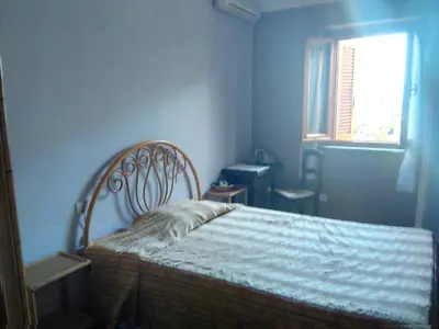 Letto o letti in una camera di Albergo Villa Sorriso
