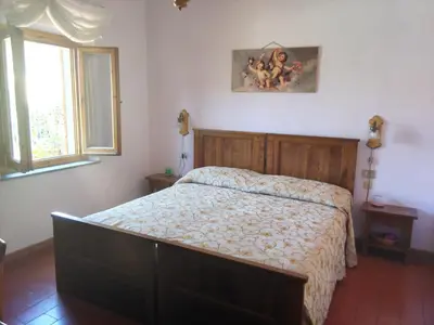 Letto o letti in una camera di Albergo Villa Sorriso
