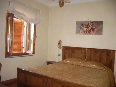 Letto o letti in una camera di Albergo Villa Sorriso