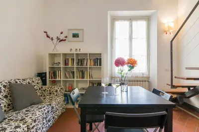 Area soggiorno di GuestHost - Della Scala Modern Apartment