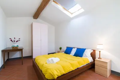 Letto o letti in una camera di GuestHost - Della Scala Modern Apartment