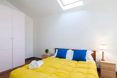 Letto o letti in una camera di GuestHost - Della Scala Modern Apartment