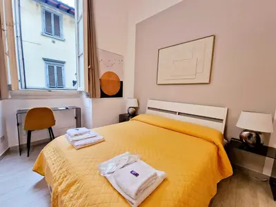 Letto o letti in una camera di Locanda Pitti